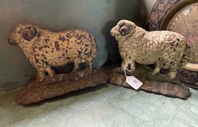 Lot 69 - Two Victorian cast iron ram door stops.