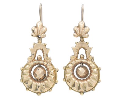 Lot 29 - A pair of Victorian hollow gold pendant earrings.