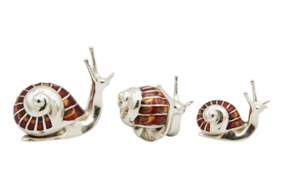 Lot 205 - A set of three contemporary silver and enamel novelty graduated snail models.