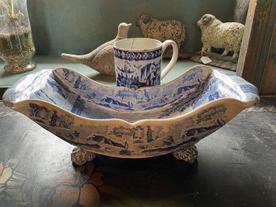 Lot 94 - A Staffordshire blue and white pottery cheese coaster.