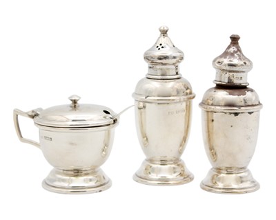 Lot 140 - A silver three piece cruet by John Rose.