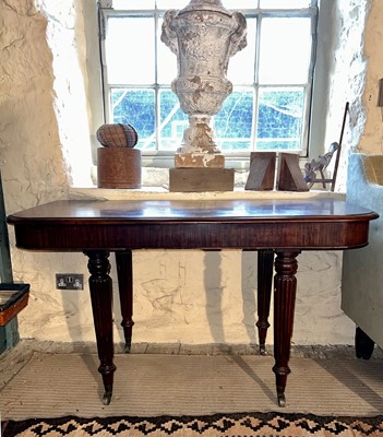 Lot 423 - A Regency Dining Table