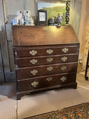 Lot 403 - An oak bureau