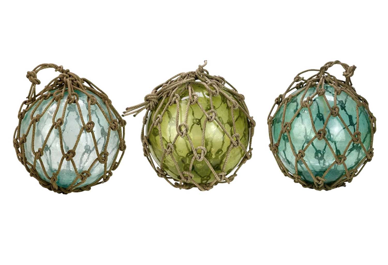 Lot 33 - Three large blown glass fishing floats.