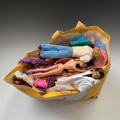 Lot 607 - DOLLS: A bag containing 17 Barbie & Ken dolls...