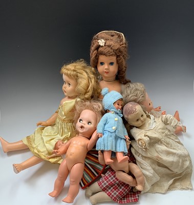 Lot 608 - DOLLS: A bag contaiing 12 dolls of varying...