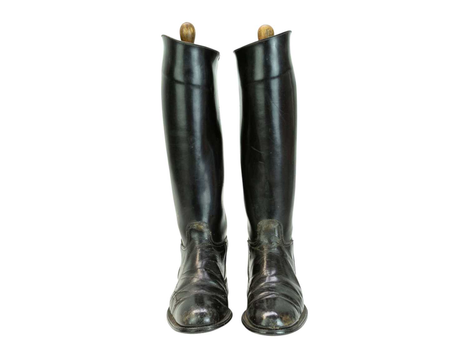 Lot 31 - A pair of black leather riding boots and trees.