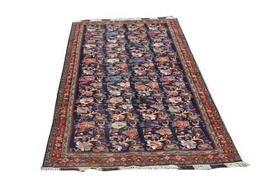 Lot 465 - A North West Persian carpet, the indigo field...