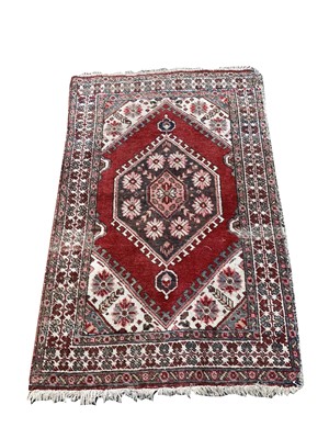 Lot 463 - A South West Persian rug, the madder field...