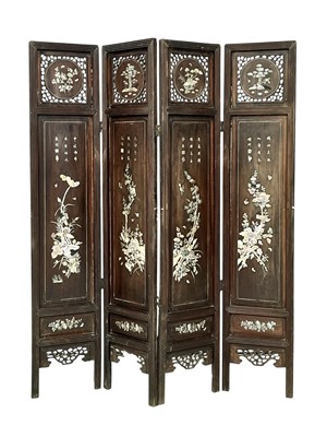 Lot 570 - A Chinese hardwood and mother-of-pearl inlaid four-fold screen.