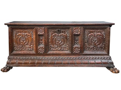 Lot 869 - An Italian carved walnut cassone.