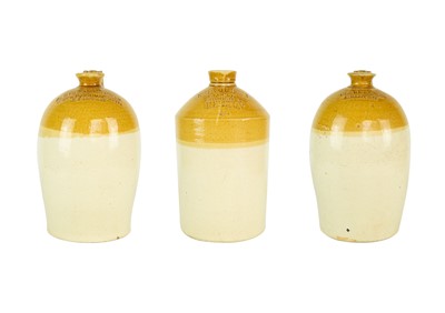 Lot 429 - Two Clarke and Co of Helston stoneware flagons.