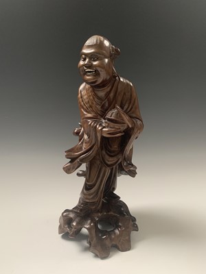 Lot 116 - A Chinese carved hardwood figure of buddha,...