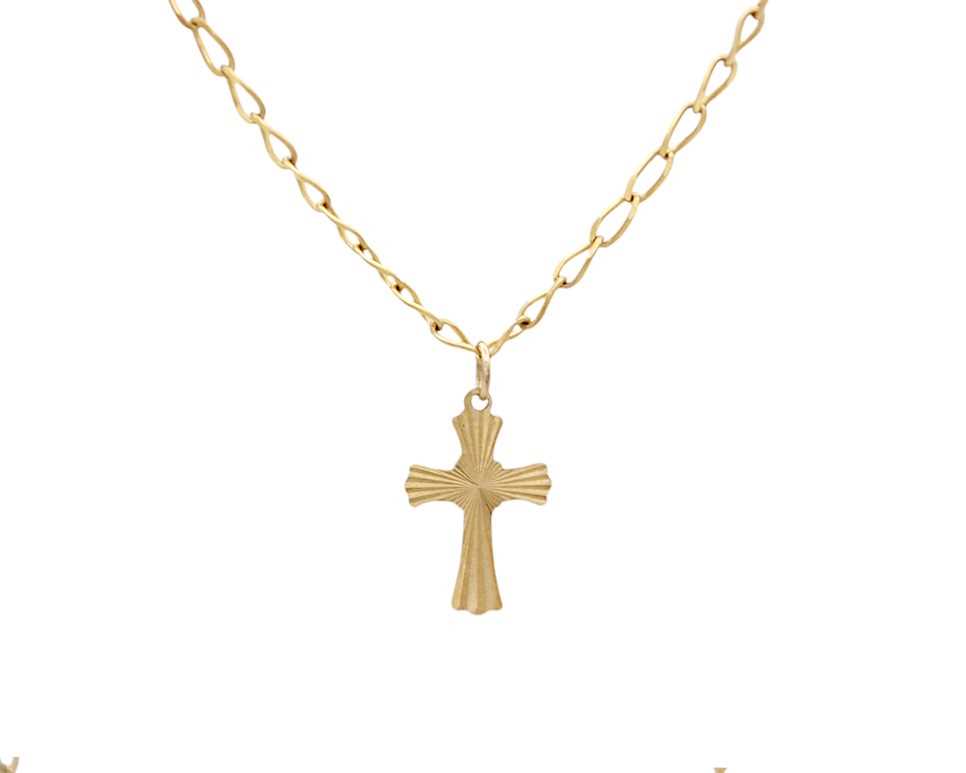 Lot 22 - A 9k gold cross pendant on fancy cable link chain.