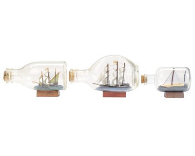 Lot 12 - Eight ships in bottles.