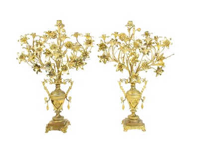 Lot 87 - A pair of ornate large French gilt metal candelabra.