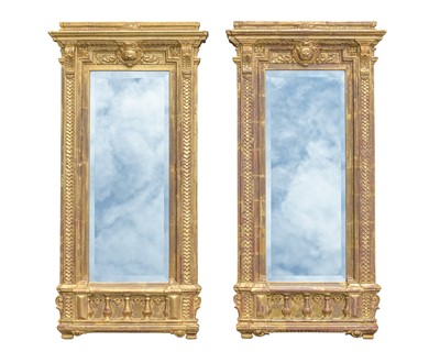 Lot 528 - A pair of gilt empire style wall mirrors.