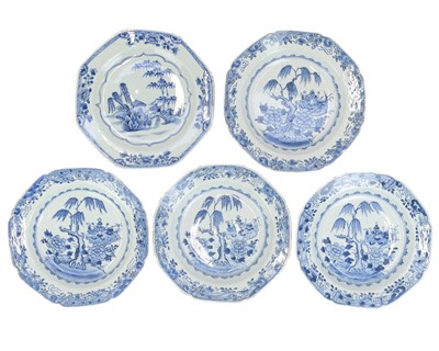 Lot 402 - A set of four Chinese export blue and white soup bowls.