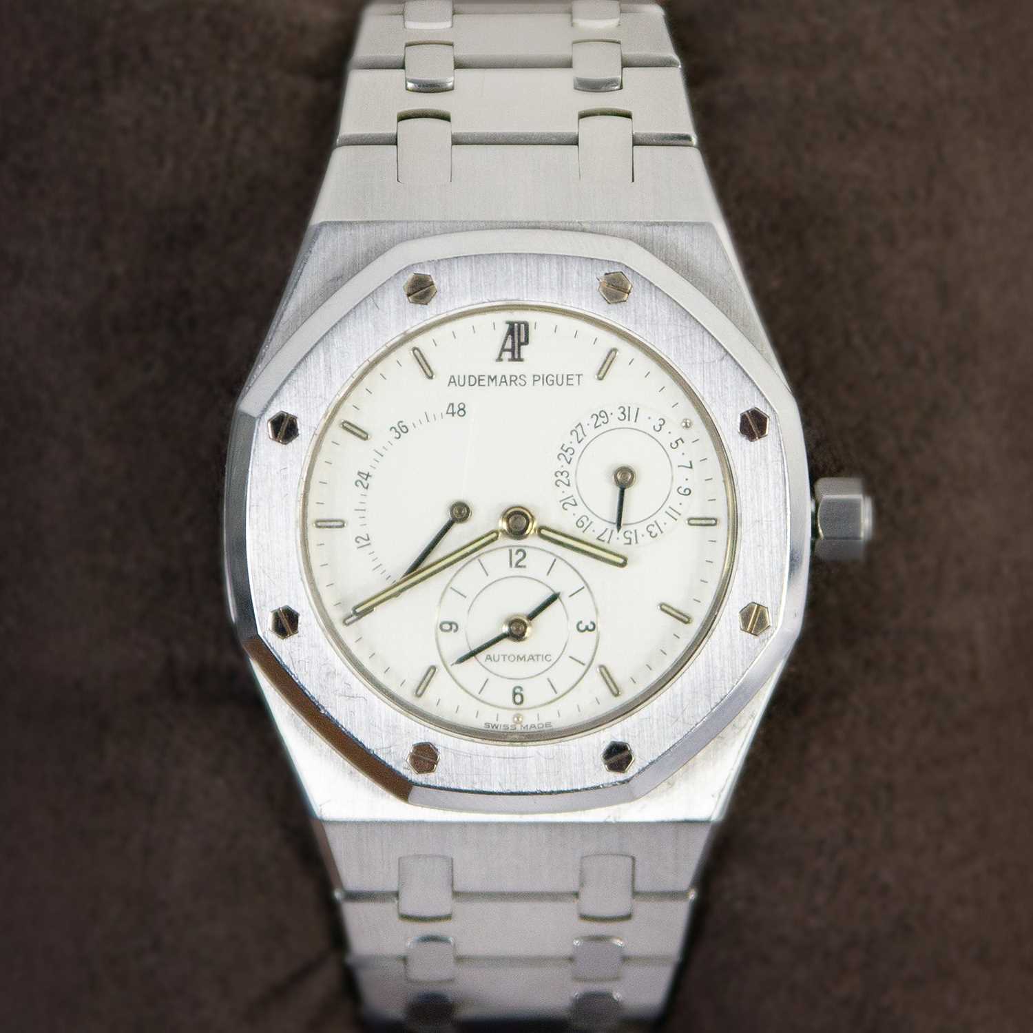 Lot 618 - AUDEMARS PIGUET - A Royal Oak Dual Time Power Reserve stainless steel gentleman's bracelet watch.