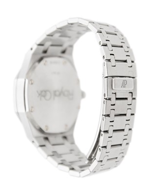 Lot 618 - AUDEMARS PIGUET - A Royal Oak Dual Time Power Reserve stainless steel gentleman's bracelet watch.