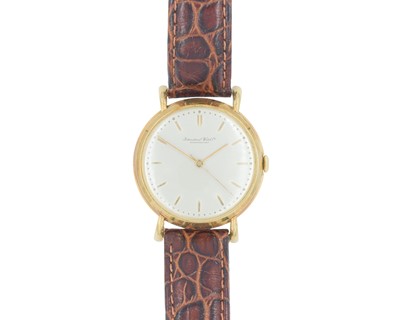 Lot 639 - INTERNATIONAL WATCH CO - An 18k manual wind gentleman's dress wristwatch.
