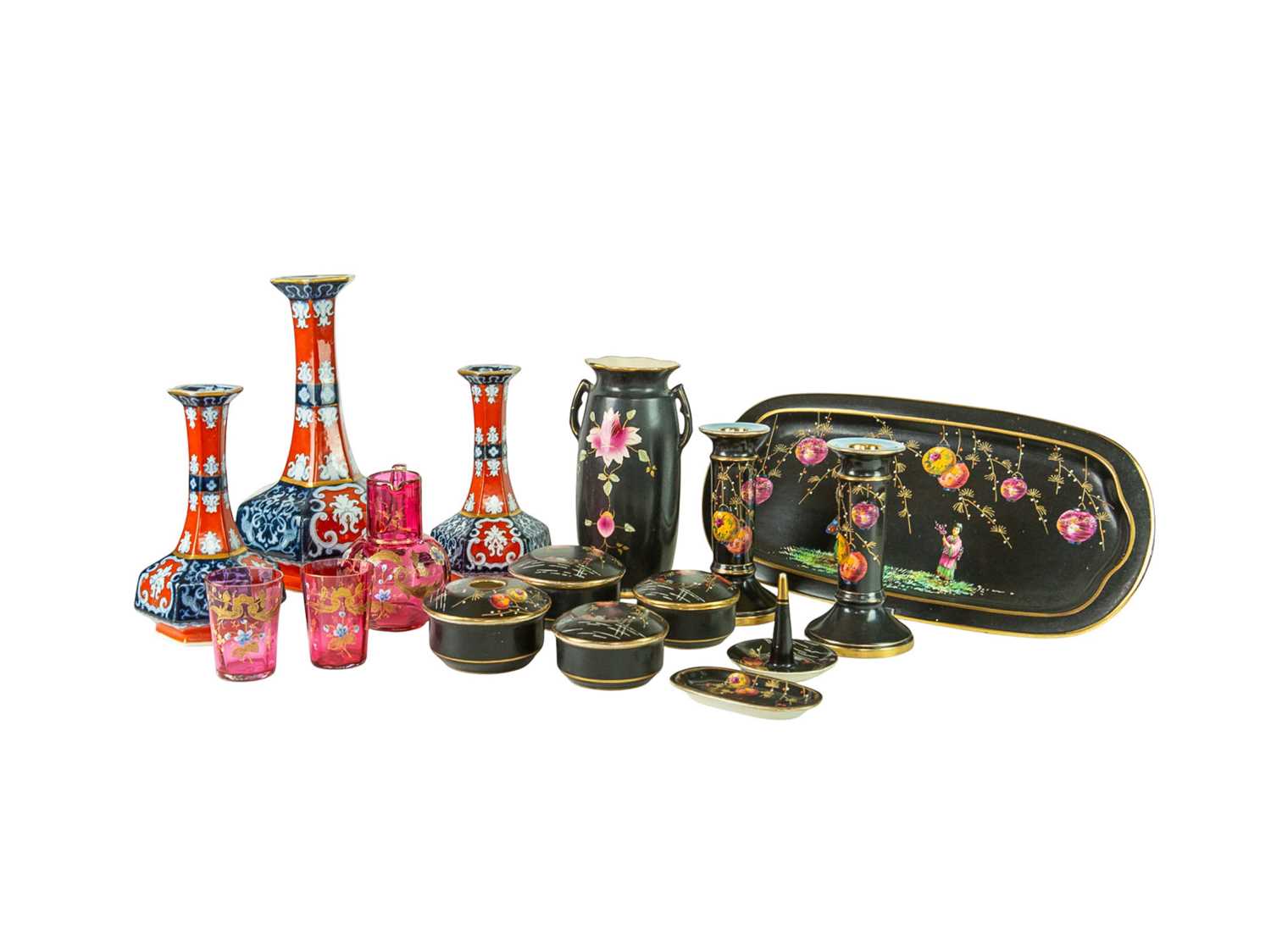 Lot 48 - A Victorian ironstone vase of hexagonal form, together with a pair of matching smaller vases.