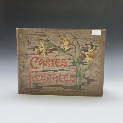 Lot 811 - Postcards: A large postcard album containing a...