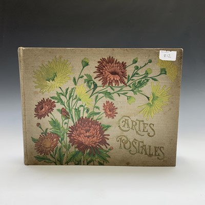 Lot 812 - Postcards: A large postcard album containing a...