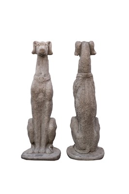 Lot 868 - A pair of large cast stone sculptures of seated whippets.