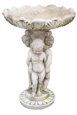Lot 881 - A reconstituted stone bird bath.