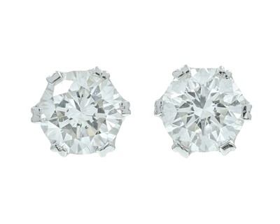 Lot 275 - A good pair of 18k white gold 1.60ct diamond solitaire stud earrings.