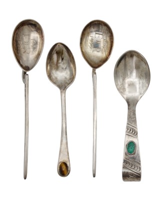 Lot 167 - A pair of QEII silver 'Corinium' spoons, together with two stone set silver spoons.