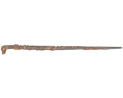 Lot 4 - A 20th century Mexican carved hardwood walking stick.