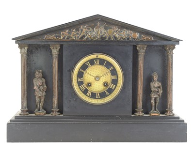 Lot 887 - A Victorian black slate mantel clock.