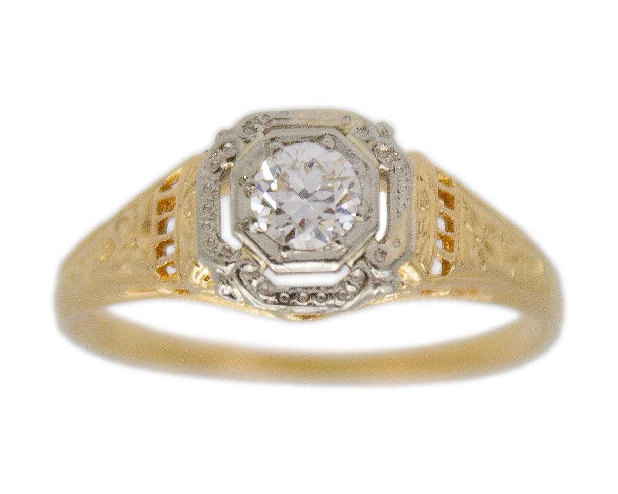 Lot 47 - An antique continental 18k gold with a diamond solitaire ring.