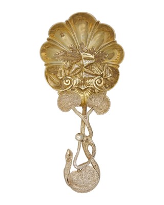 Lot 42 - A Victorian ornate silver gilt caddy spoon, possibly by Hilliard & Thomason.