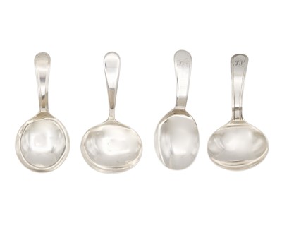 Lot 26 - Two similar George III silver caddy spoons by Elizabeth Morley.