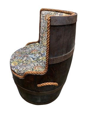 Lot 788 - A 19th century oak and metal bound coopered barrel, converted to a seat.