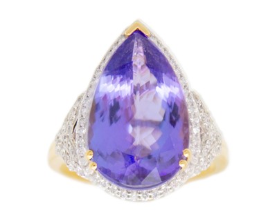 Lot 65 - LORIQUE - an 18k gold tanzanite and diamond dress ring.