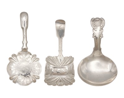 Lot 31 - A selection of three early 19th century silver caddy spoons.