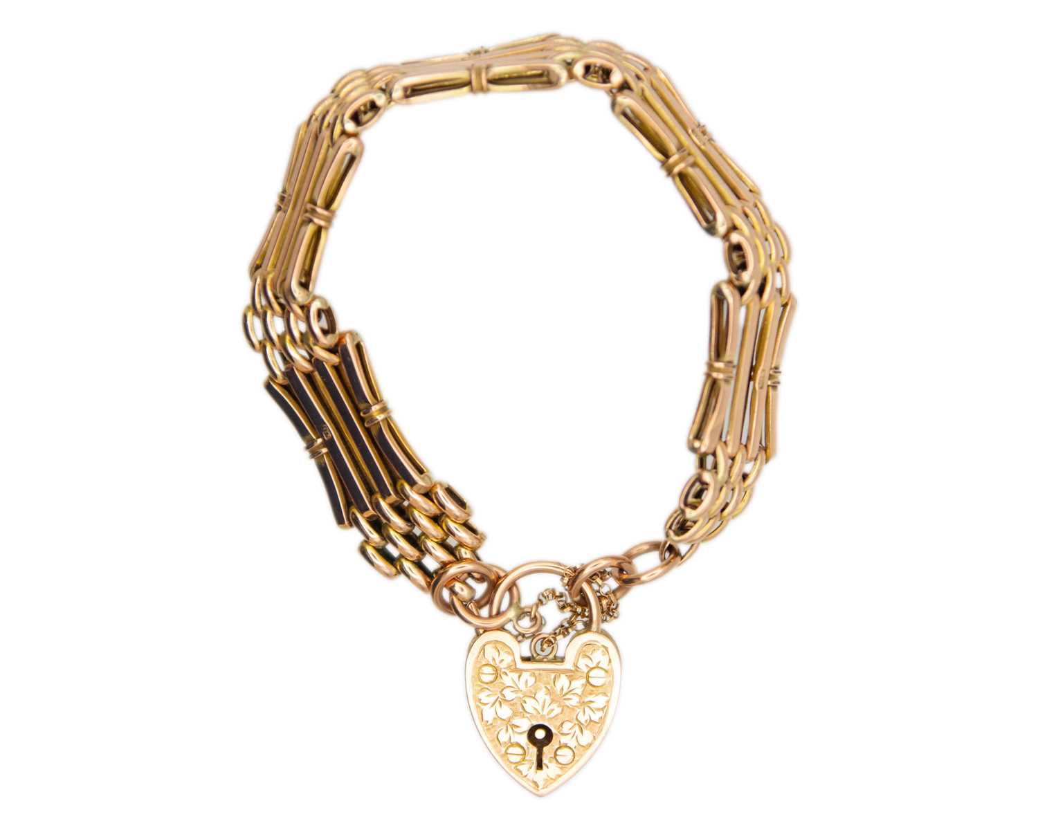 Lot 9 - A 9k rose gold gate bracelet.