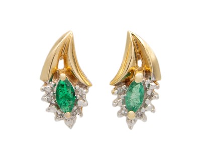 Lot 75 - A pair of 10k gold, emerald and diamond stud earrings.