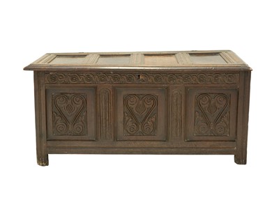 Lot 728 - An oak panel coffer.