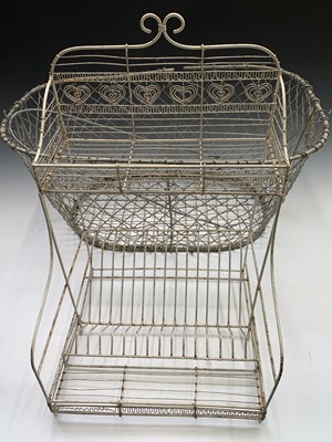 Lot 134 - A large wire basket and a wire dish rack (2)....