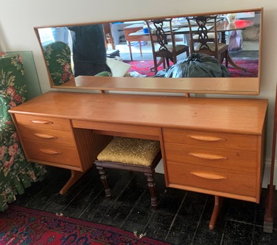 Lot 3163 - A 1970's teak dressing table with adjustable...