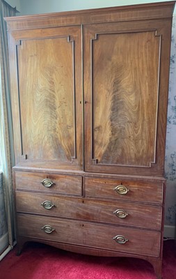 Lot 3006 - A Regency mahogany linen press, the upper part...