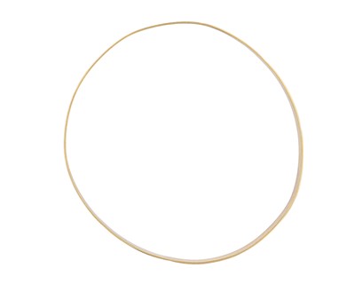Lot 5 - A 21k gold engraved design bangle.