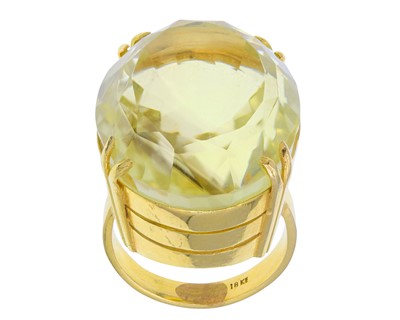 Lot 4 - A heavy 18k gold 50ct citrine set dress ring.