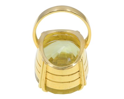 Lot 4 - A heavy 18k gold 50ct citrine set dress ring.