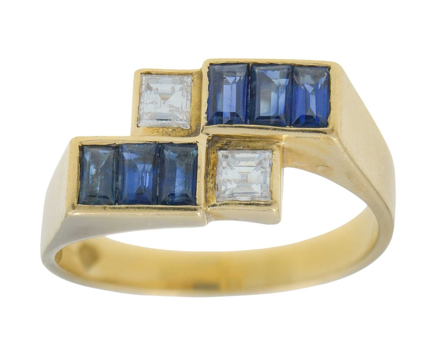 Lot 12 - An 18k gold sapphire and diamond geometrical design ring.